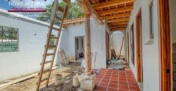T54 – House under construction in the Hacienda del Comendador residential community